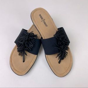 Minnetonka sandal fringe detail, black, size 7.5